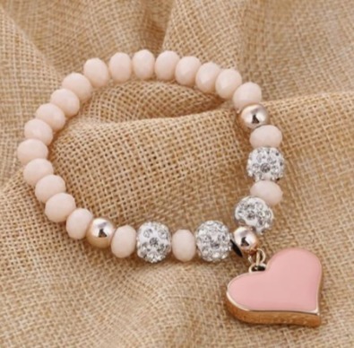 Pulsera de cristal rosa con dije de corazón